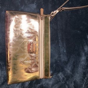 MK rose gold large wristlet